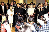 Prince and Princess Mikasa enjoys children's dancing with the officials of the festival