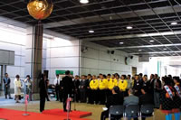 Exhibitors and the officials attend the opening ceremony