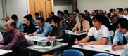 Attendants seriously listen to the lecture